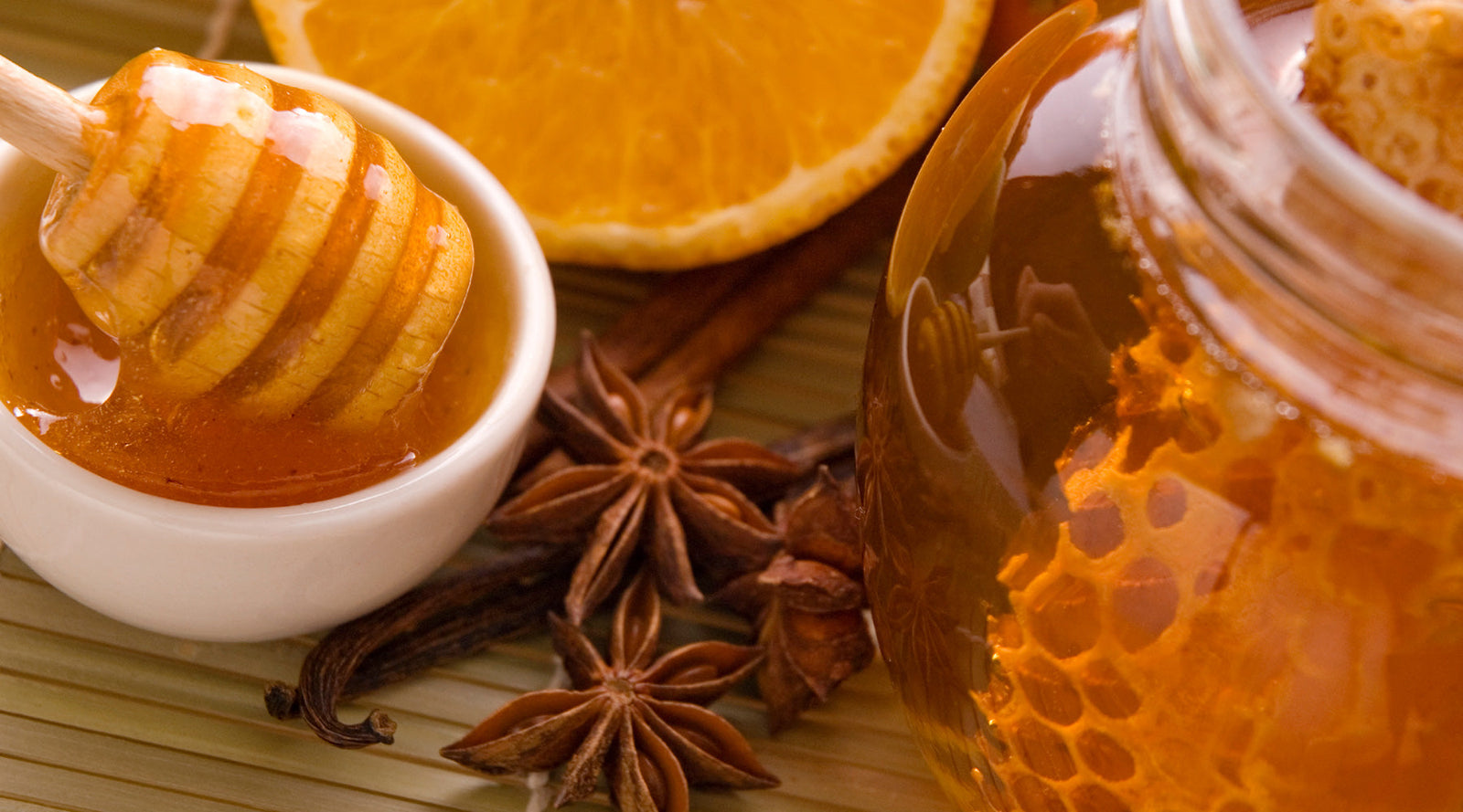 Table set with Manuka Honey, Star Anis and oranges. Can you boost your immunity with Manuka Honey?