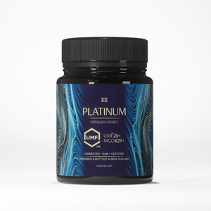 Platinum Manuka Honey jar with blue and black design on a white background