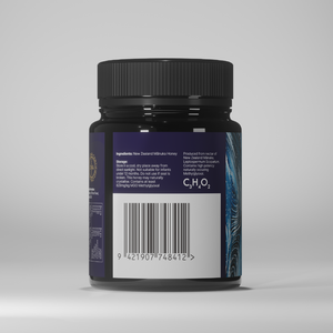 Black jar with a blue label on a gray background