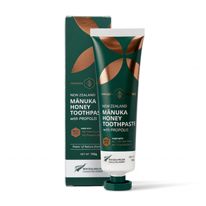 Manuka Honey toothpaste tube and box on a white background
