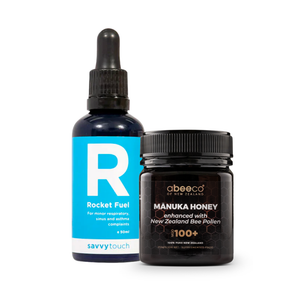 Bottle of Rocket Fuel and jar of Manuka Honey on a white background