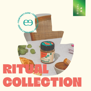 Product with 'Ritual' branding on a table with greenery, jar, and cup.
