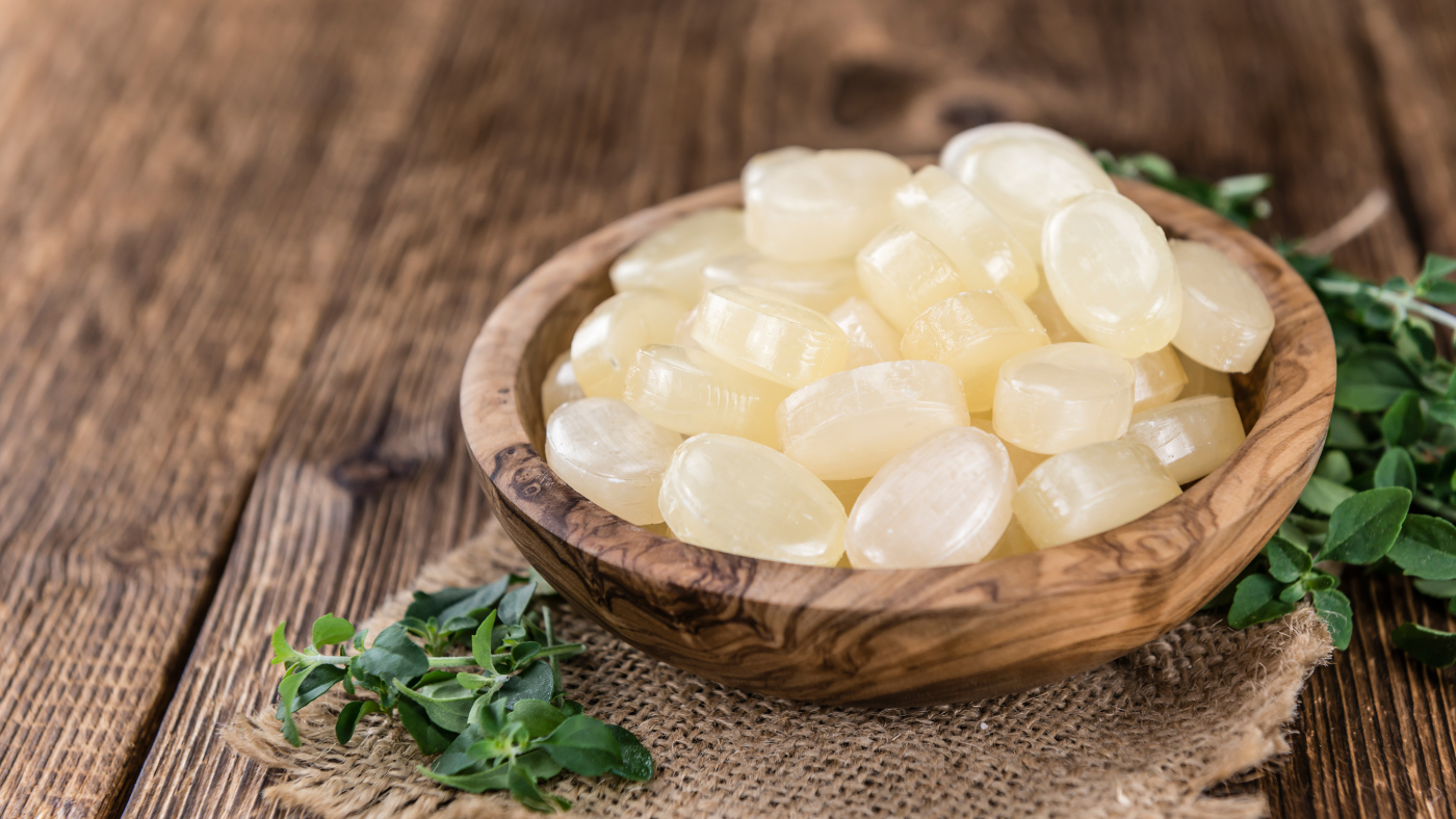 Manuka Honey Lozenges in a bowl - a natural support for sore throats and cough