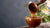 Honey dripping from a wooden dipper into a bowl