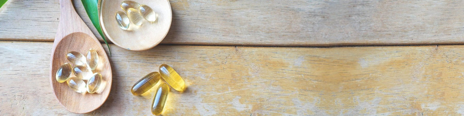 Health and supplements collection banners showing vitamins on a wooden table
