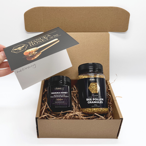 Box containing Manuka Honey and Bee Pollen Granules with a card on a white background