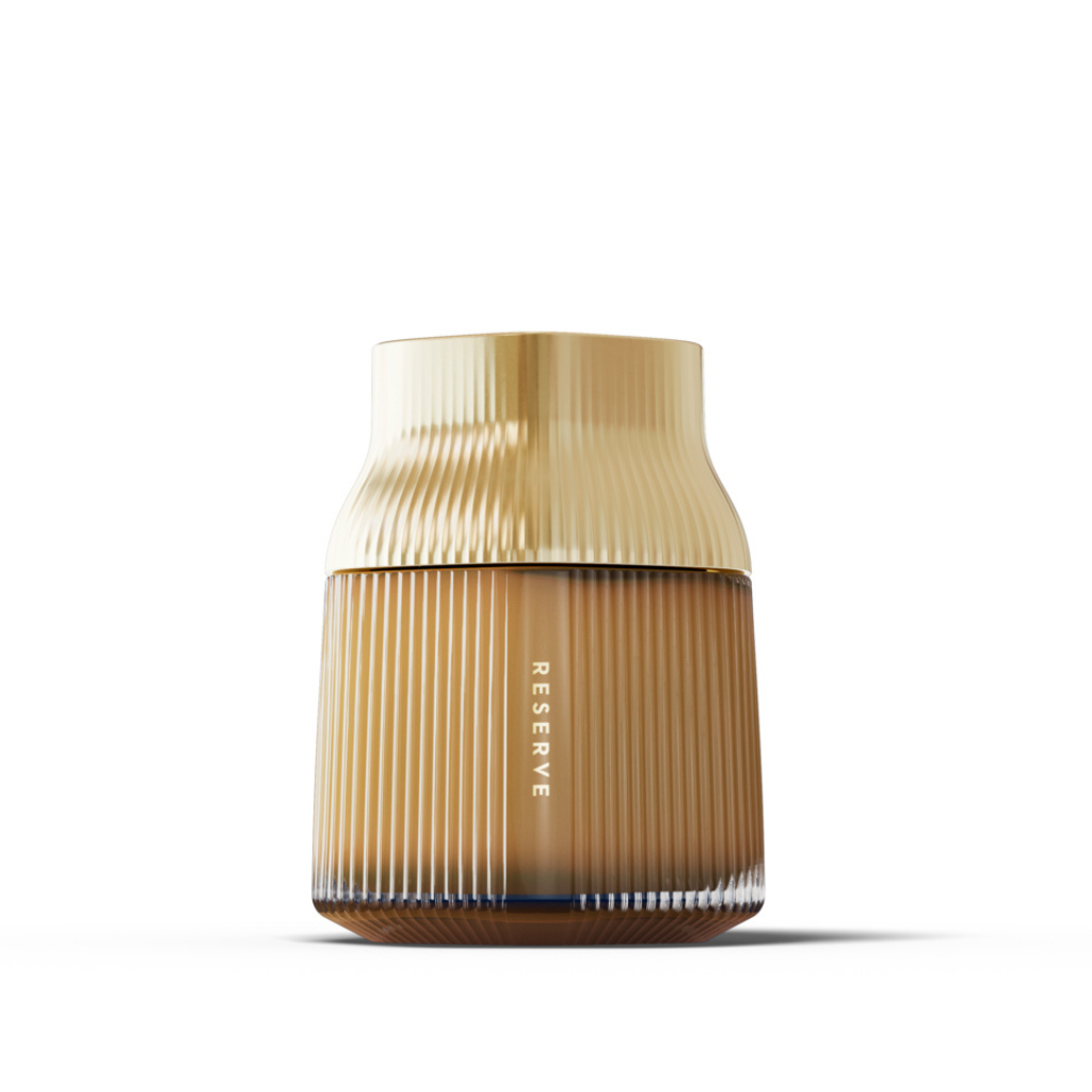 Manuka Health MGO1000+ Gold and brown cylindrical jar with 'RESERVE' branding on a white background