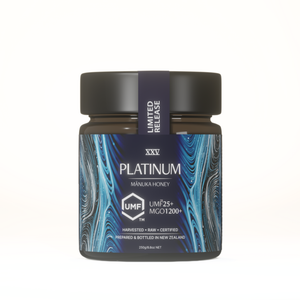 Platinum Manuka Honey jar with UMF and MGO certification on a white background