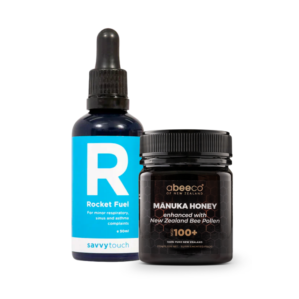 Bottle of Rocket Fuel and jar of Manuka Honey on a white background
