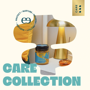 Promotional graphic for the 'CARE Collection' featuring a collage of lifestyle elements including a brass table lamp, a jar of honey, and a yellow garment, all framed within a large abstract shape. The text 'CARE COLLECTION' is written in bold teal letters at the bottom, and a gold 'CARE' logo is in the top right corner.