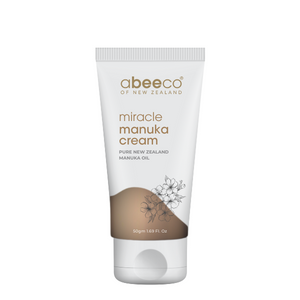 Tube of Abeeco Miracle Manuka Cream on a white background