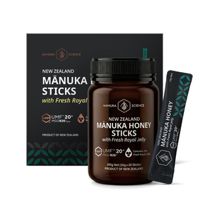 Manuka Science New Zealand Mânuka Sticks honey sticks with Fresh Royal Jelly, featuring a dark amber jar, a black box, and an individual stick pack on a clean white background.