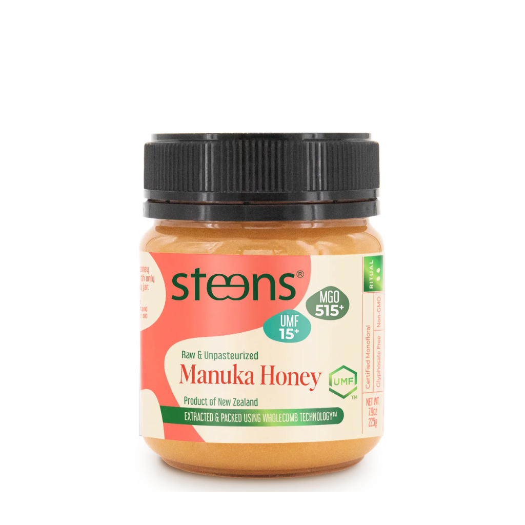 A jar of Steons Manuka Honey on a plain white background. The jar has a black ribbed lid and a label with coral, cream, and green sections, showing the Steons brand and Manuka Honey product name.
