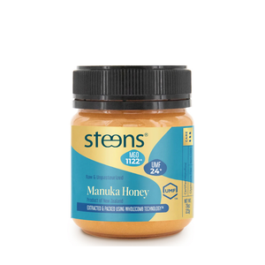 A jar of Steens Manuka Honey with a black screw cap and a blue and yellow label, shown on a plain white background.