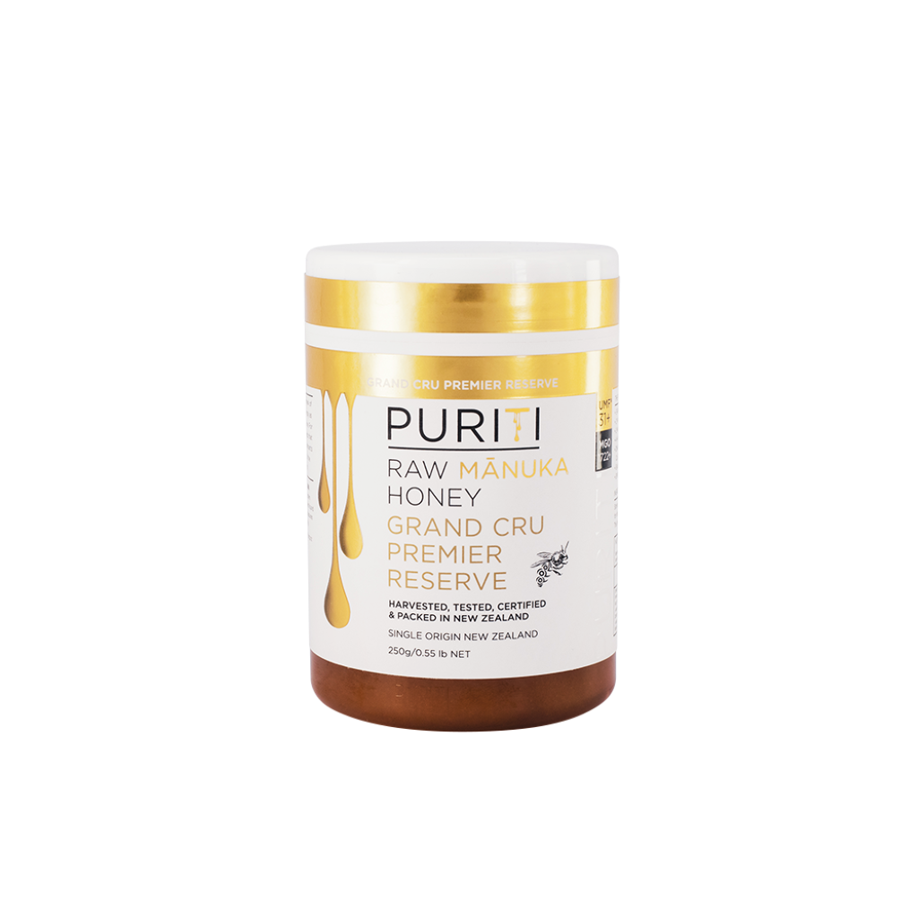 PURITI Grand Cru Premier Reserve Mānuka honey 250g jar with white and gold label.